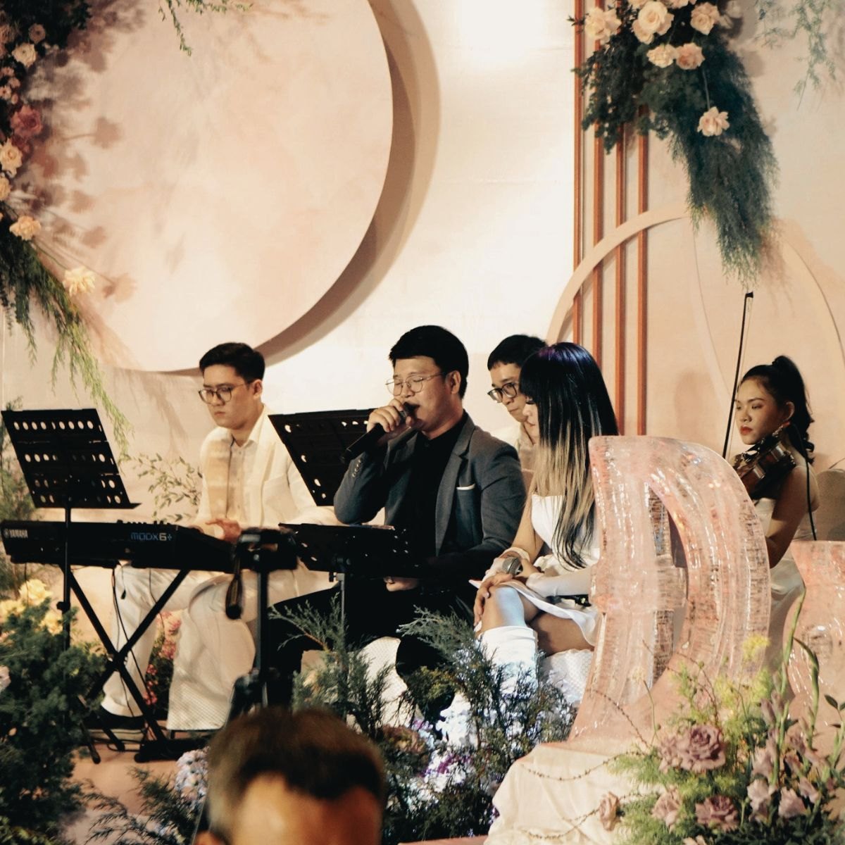 Lux Band acoustic ensemble performing with vocals, keyboard and violin at Gem Center