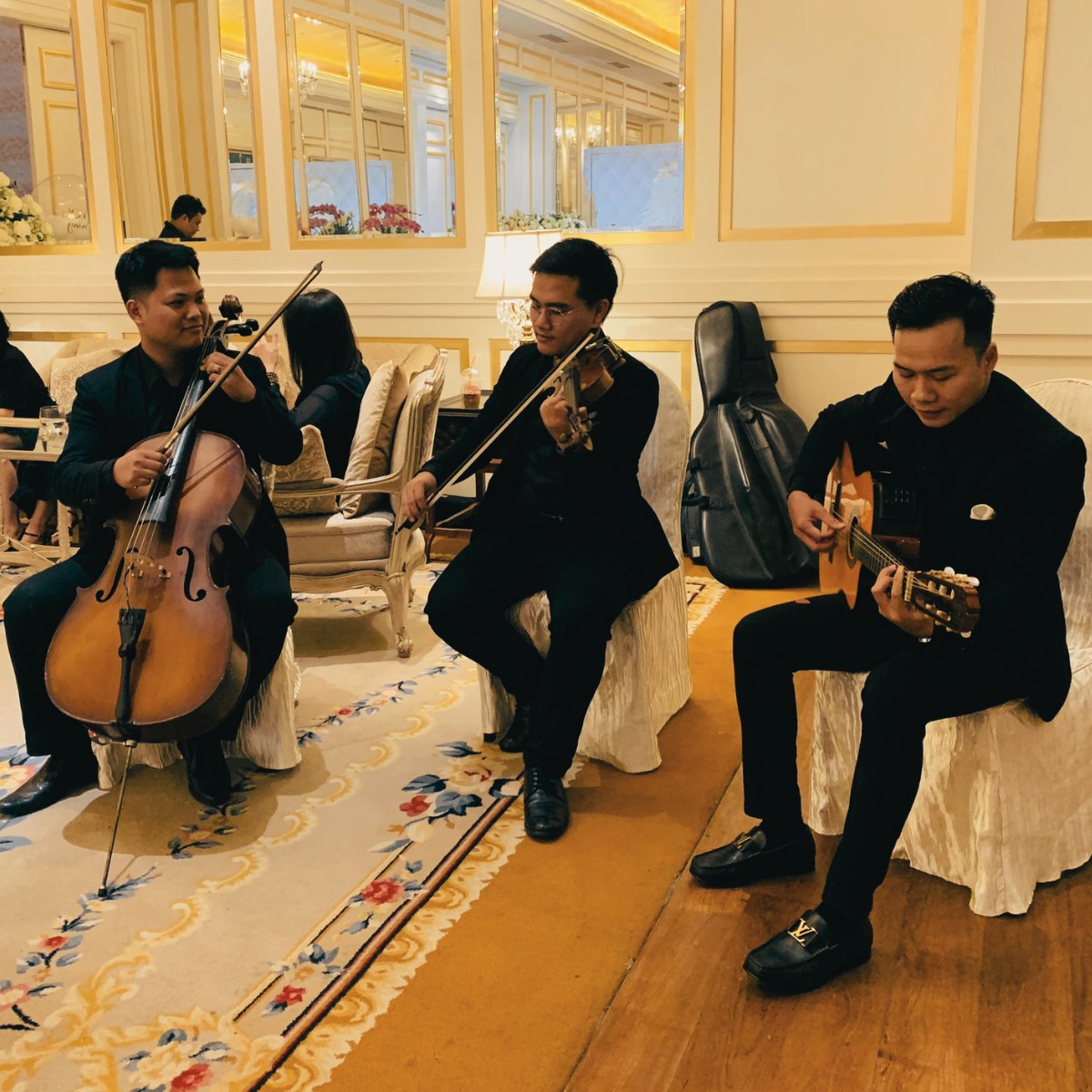 Lux Band trio performing cello, violin and guitar at Park Hyatt