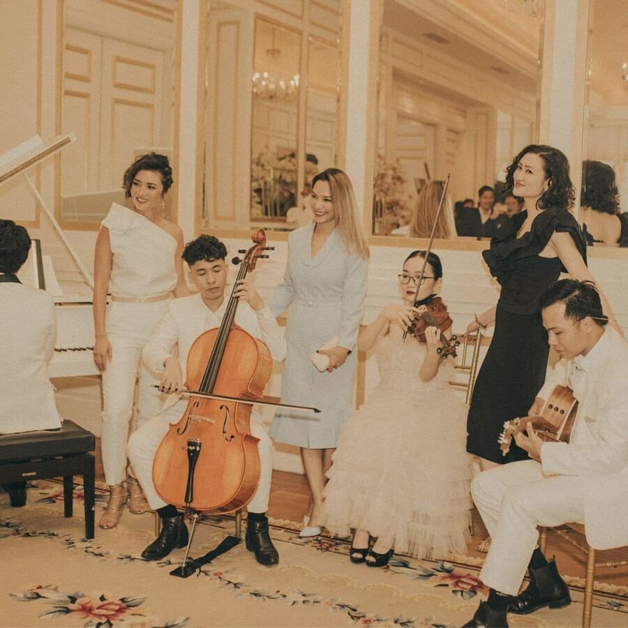 Lux Band wedding ensemble performing with piano, cello, violin, guitar and vocals as guests arrive